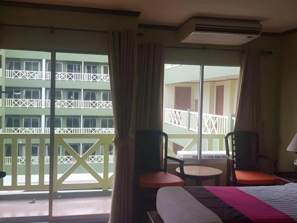 Bed in Phuphaya Resort Pattaya