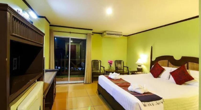 Bed in Phuphaya Resort Pattaya