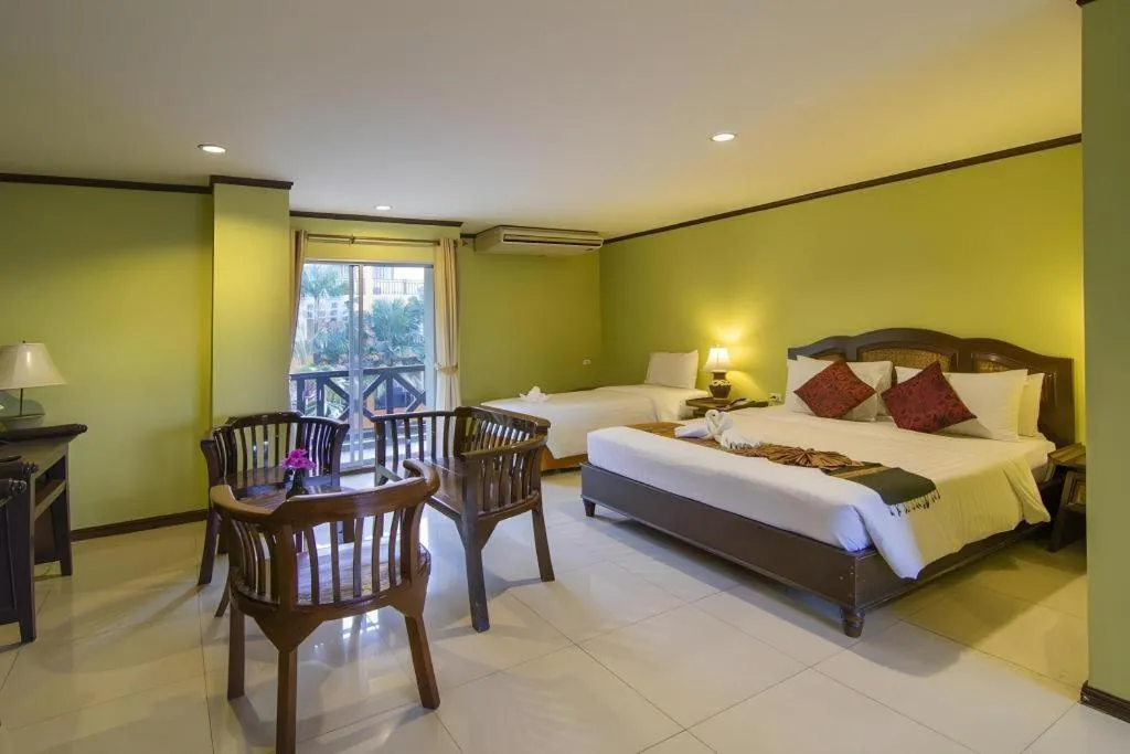 Bed in Phuphaya Resort Pattaya