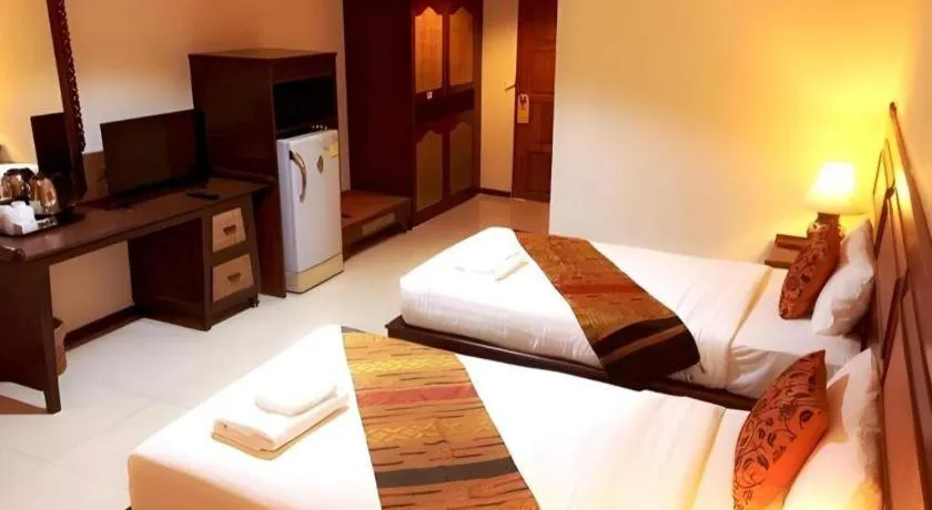 Bed in Phuphaya Resort Pattaya