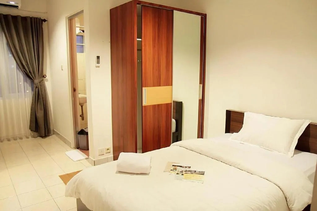 Bed in Lotus Bandung Hotel, Cafe, and Meeting Place
