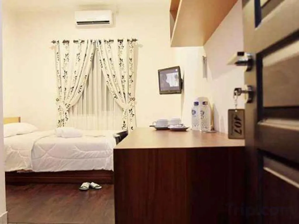 Bed in Lotus Bandung Hotel, Cafe, and Meeting Place