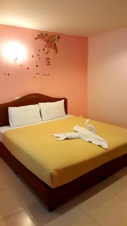 Bed in Baan Suan Sook Resort