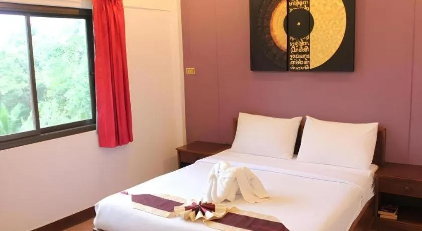 Bed in Baan Suan Sook Resort