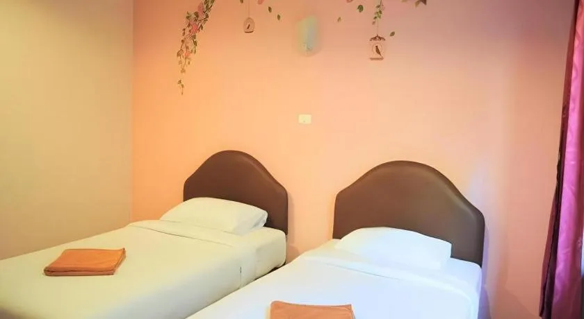 Bed in Baan Suan Sook Resort