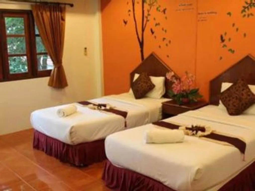 Bed in Baan Suan Sook Resort