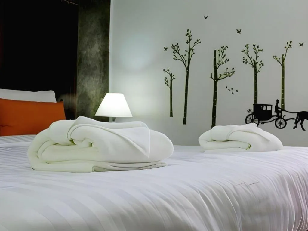 Bed in Ladawan Boutique Hotel