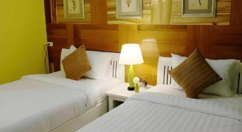 Bed in Ladawan Boutique Hotel