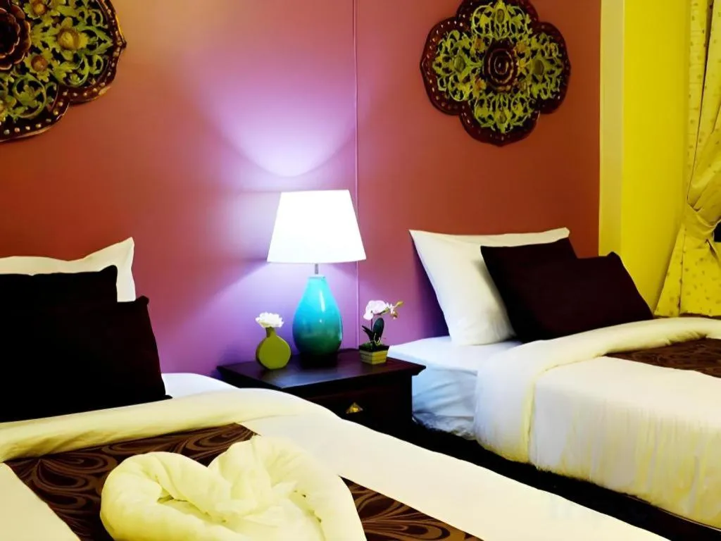Bed in Ladawan Boutique Hotel