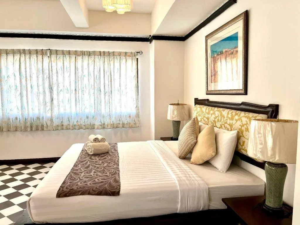 Bed in Ladawan Boutique Hotel