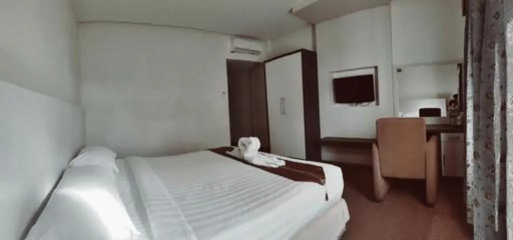 Bed in Hotel Benua
