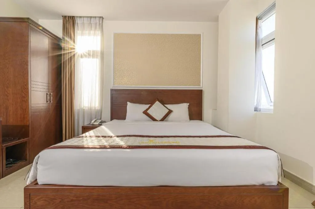 Bed in Ocean View Danang Hotel