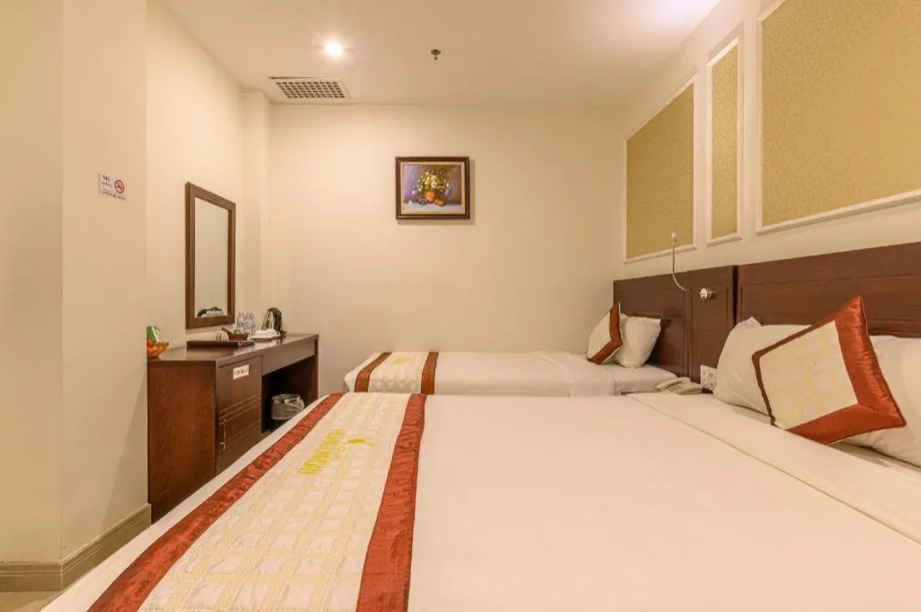 Bed in Ocean View Danang Hotel