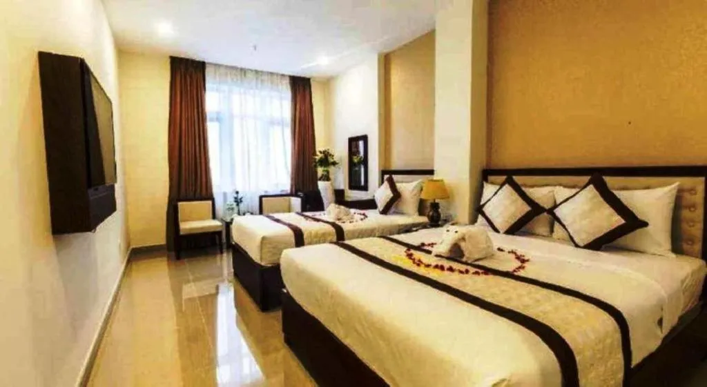 Bed in Ocean View Danang Hotel