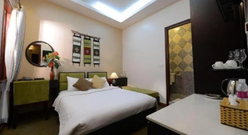 Bed in Artisan Boutique Hotel