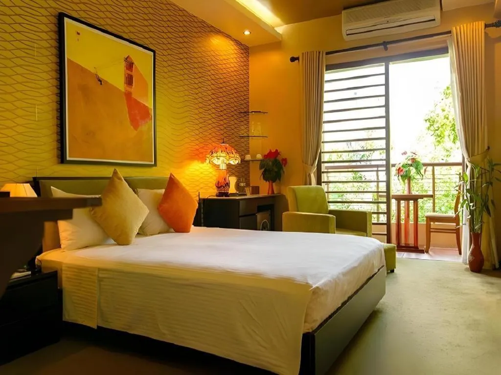 Bed in Artisan Boutique Hotel