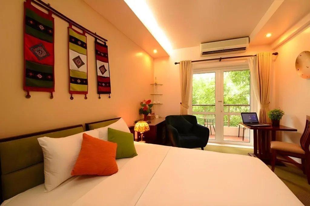 Bed in Artisan Boutique Hotel