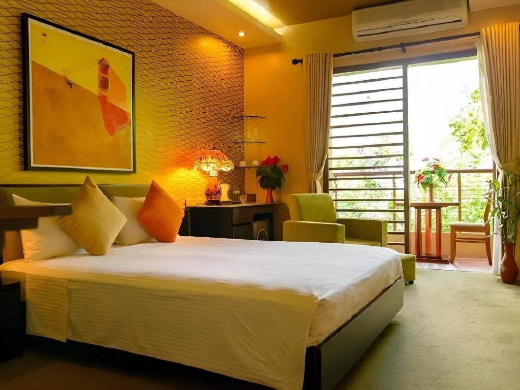 Bed in Artisan Boutique Hotel