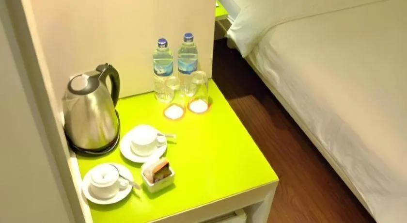 Bed in Everbright Ambon Hotel