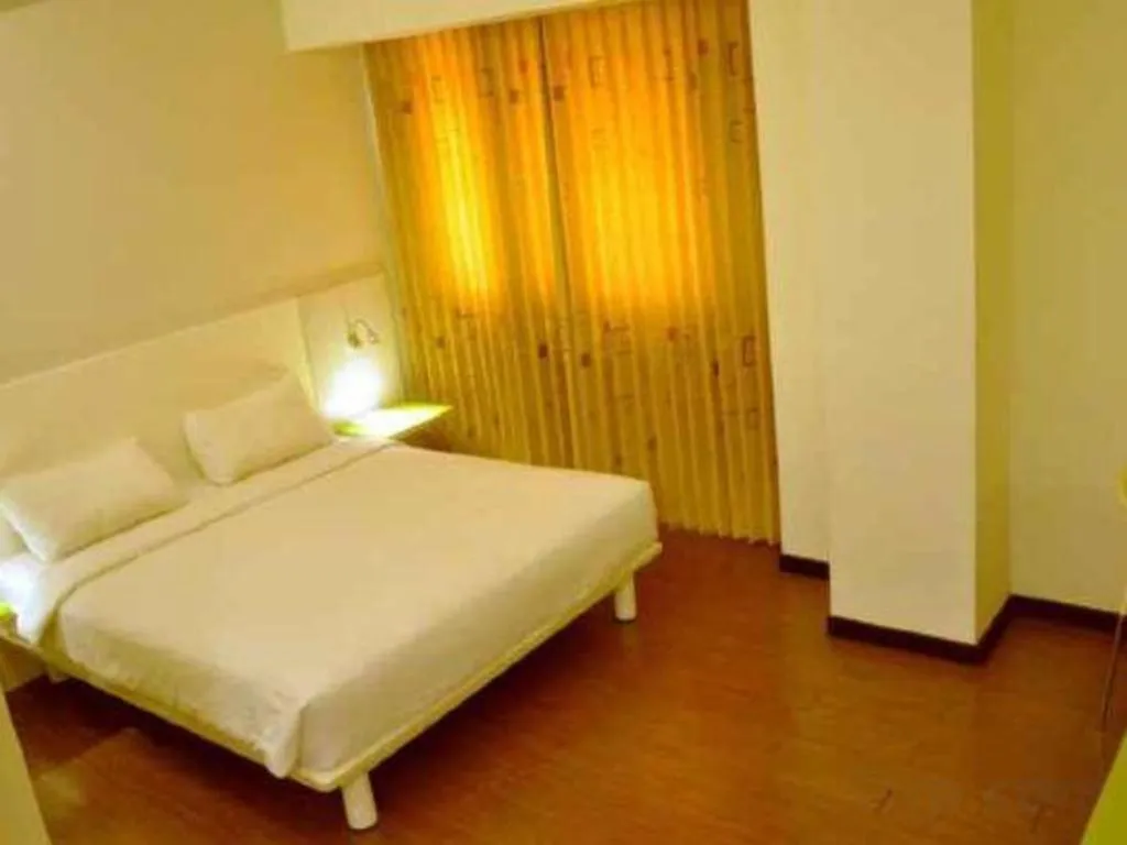 Bed in Everbright Ambon Hotel