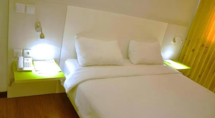 Bed in Everbright Ambon Hotel