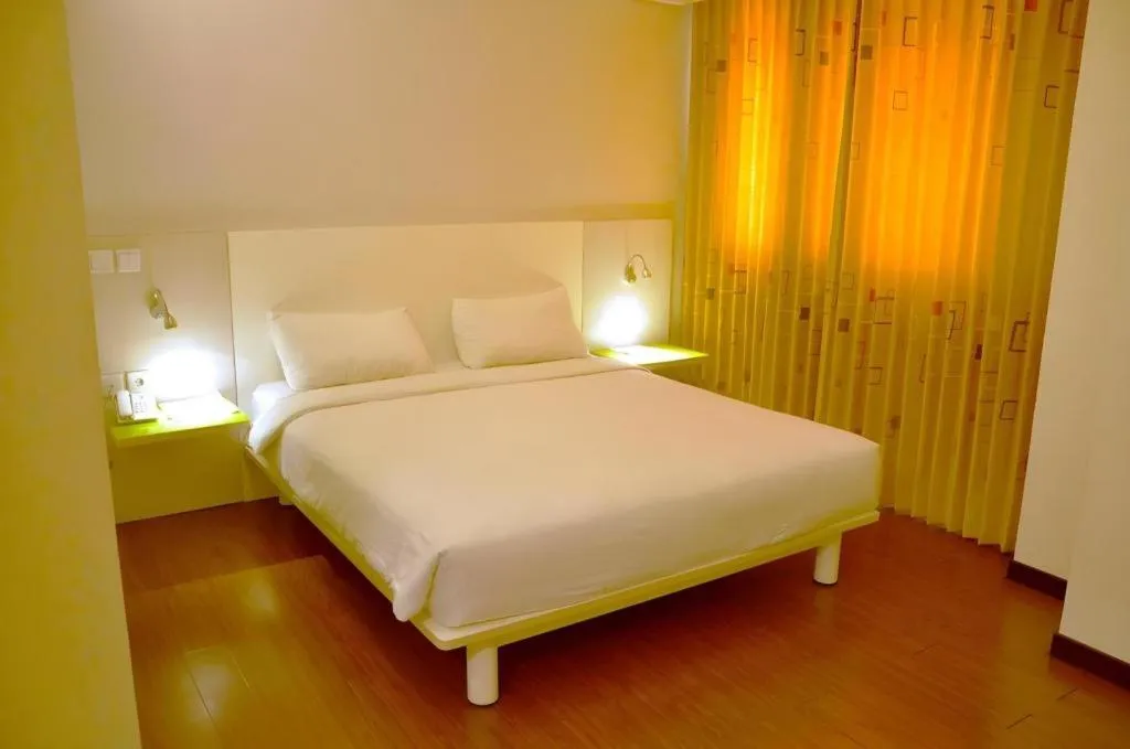 Bed in Everbright Ambon Hotel