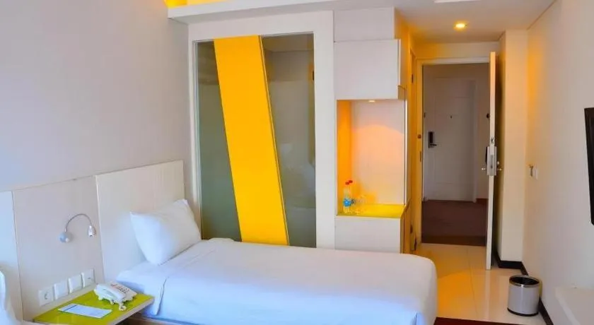 Bed in Everbright Ambon Hotel