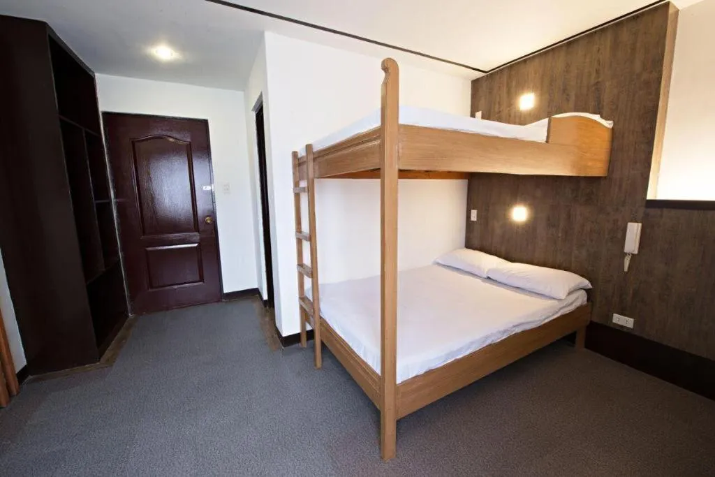 Bed in Hotel Henrico Kisad