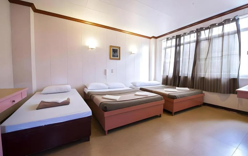 Bed in Hotel Henrico Kisad