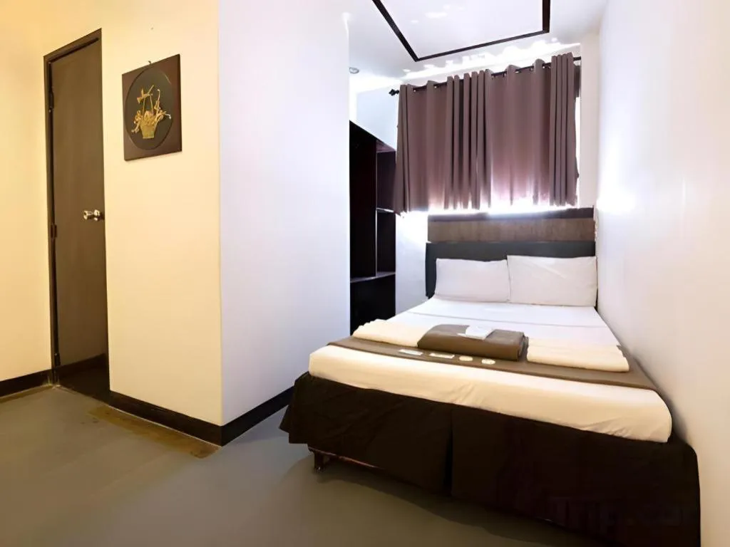 Bed in Hotel Henrico Kisad