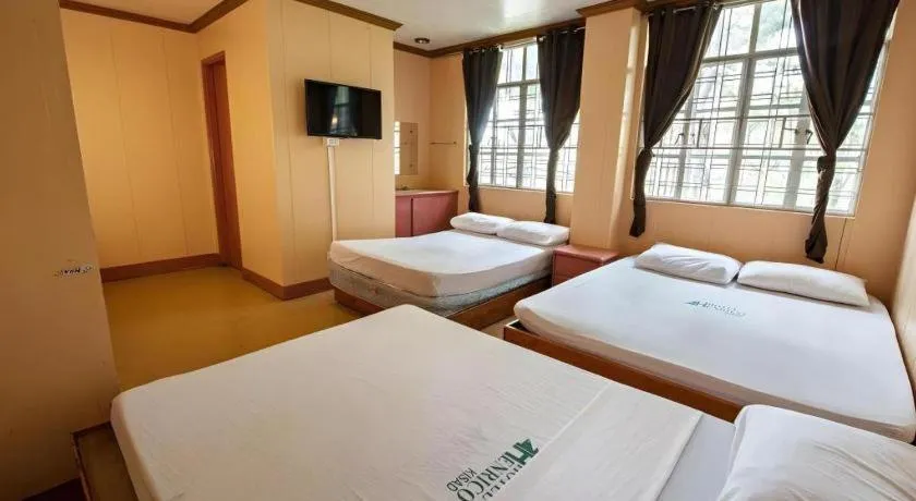 Bed in Hotel Henrico Kisad