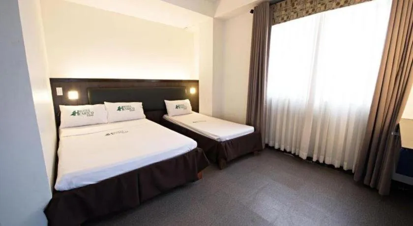 Bed in Hotel Henrico Kisad