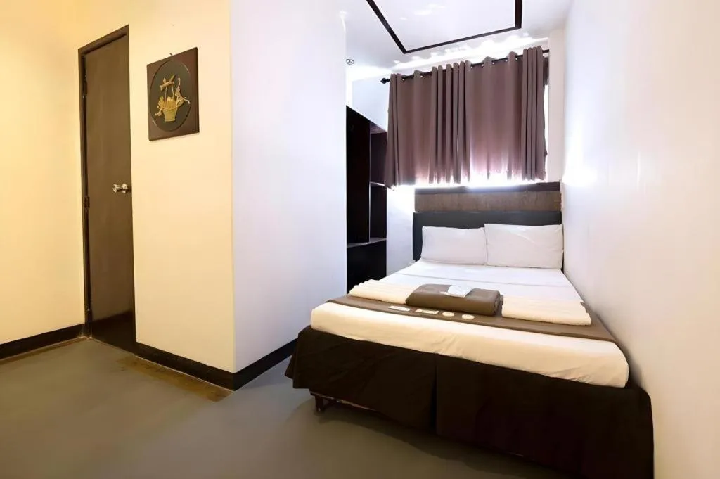 Bed in Hotel Henrico Kisad