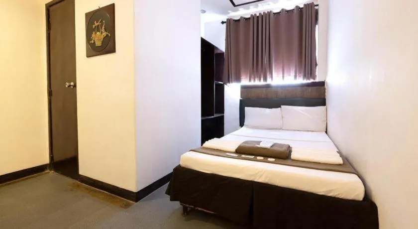 Bed in Hotel Henrico Kisad