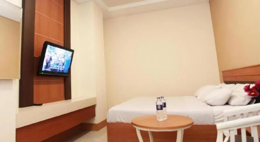 Bed in Plaza Hotel Tegal