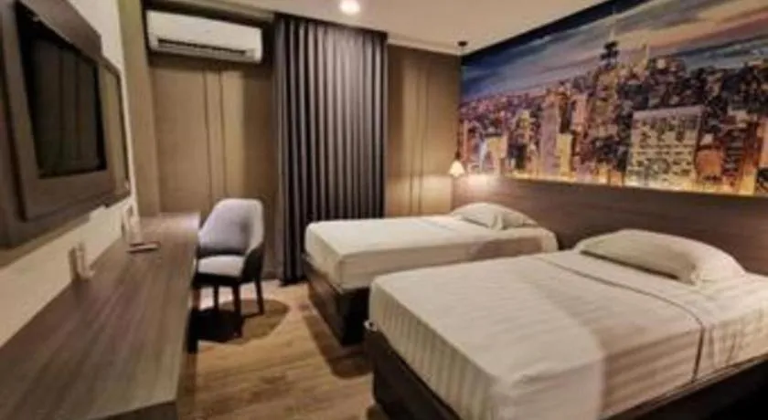 Bed in Plaza Hotel Tegal