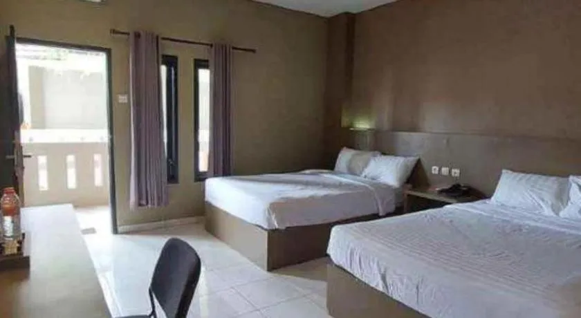 Bed in Grand Mutiara Hotel