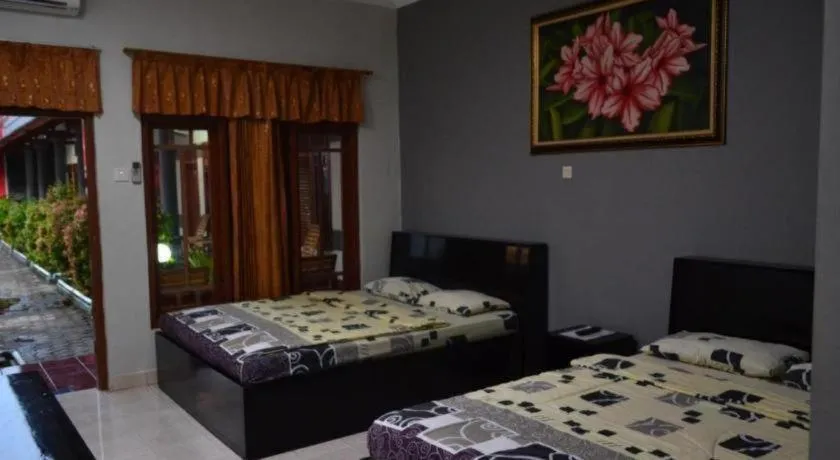 Bed in Grand Mutiara Hotel