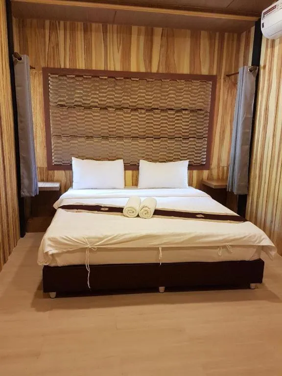 Bed in Dusit Talai Resort