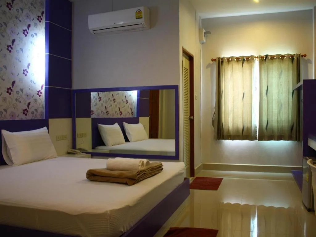 Bed in Sabai Ez Hotel