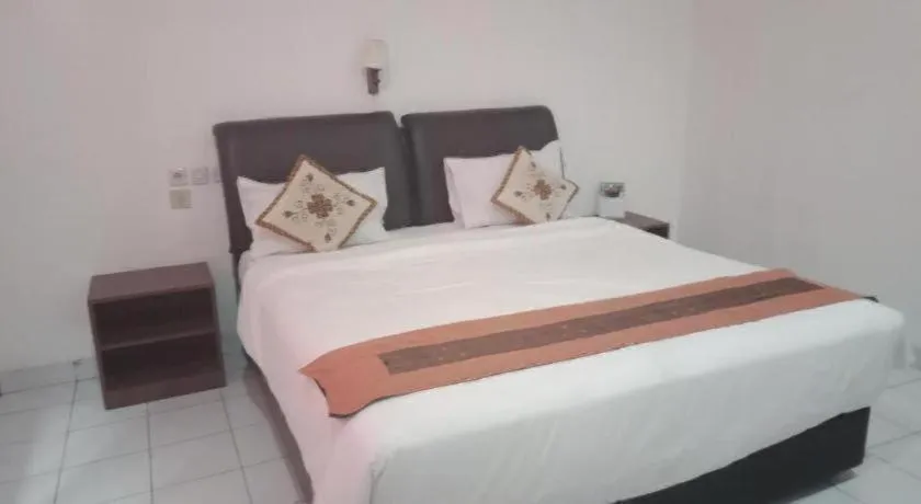 Bed in Hotel Huswah Airport