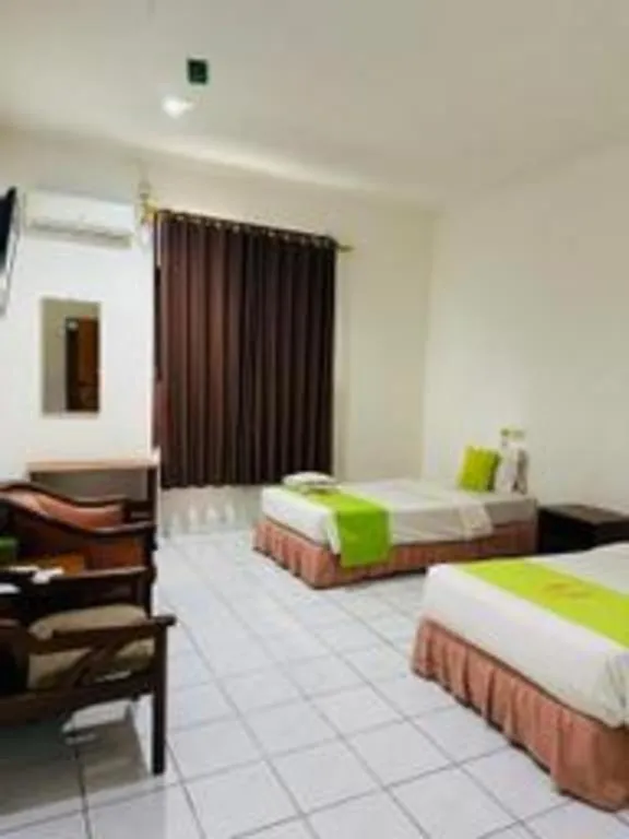 Bed in Hotel Huswah Airport