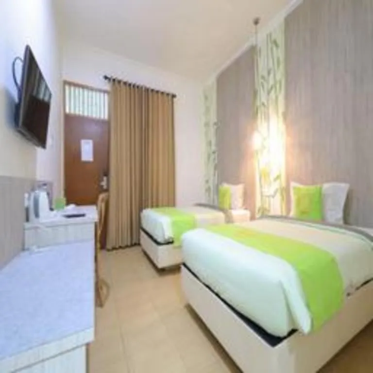 Bed in Hotel Huswah Airport