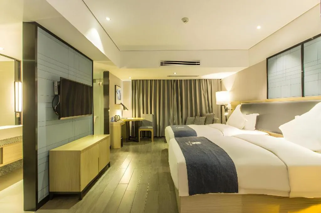 Bed in Echarm Hotel Beihai Railway Station