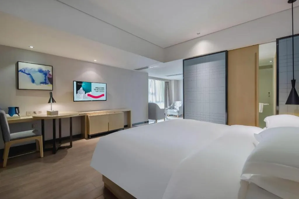 Bed in Echarm Hotel Beihai Railway Station