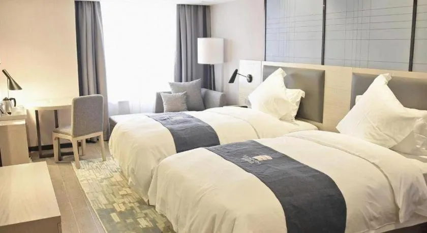 Bed in Echarm Hotel Beihai Railway Station