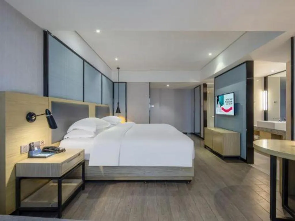 Bed in Echarm Hotel Beihai Railway Station