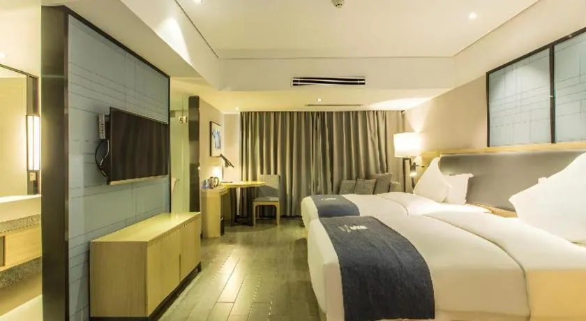 Bed in Echarm Hotel Beihai Railway Station