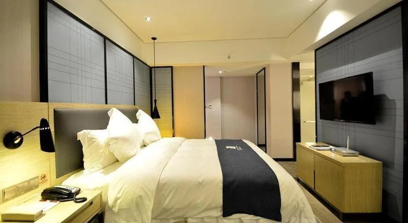 Bed in Echarm Hotel Beihai Railway Station