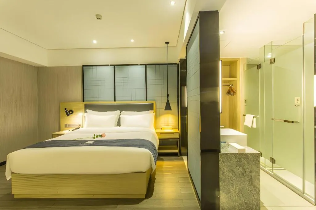 Bed in Echarm Hotel Beihai Railway Station